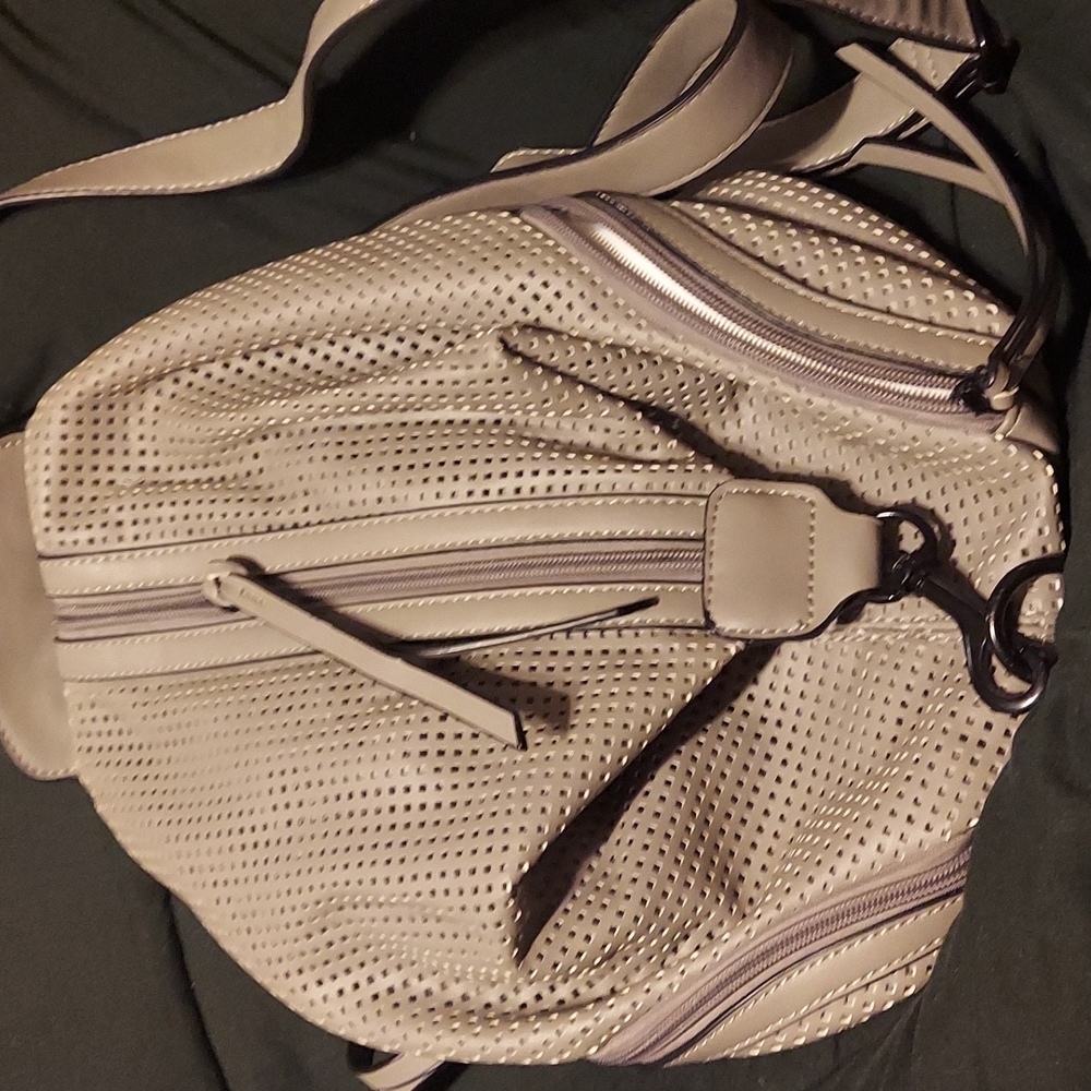 Gorpcore vibes on this grey Kate and Alex mini backpack